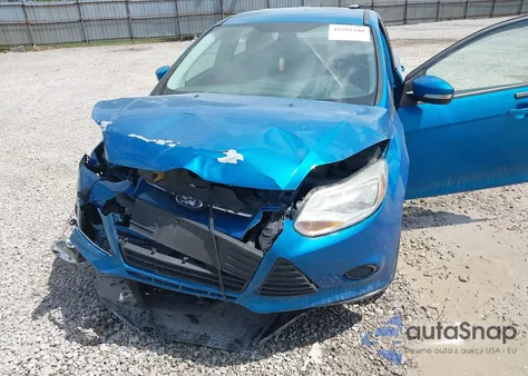 2014 Ford Focus Se z USA, uszkodzony, nr VIN 1FADP3F21EL320690